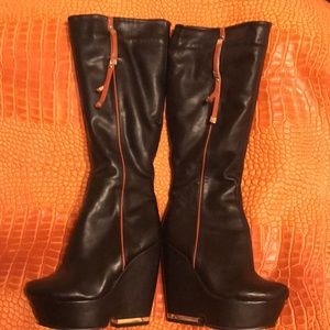 platform Black/Tan winter boots. Never worn. got too old for it. Europe made.